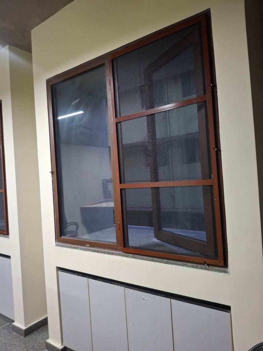 Brown aluminium section on windows at Ramakrishna Ashrama